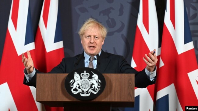 英国首相约翰逊在伦敦就英国与欧盟达成协议举行记者会。(2020年12月24日)