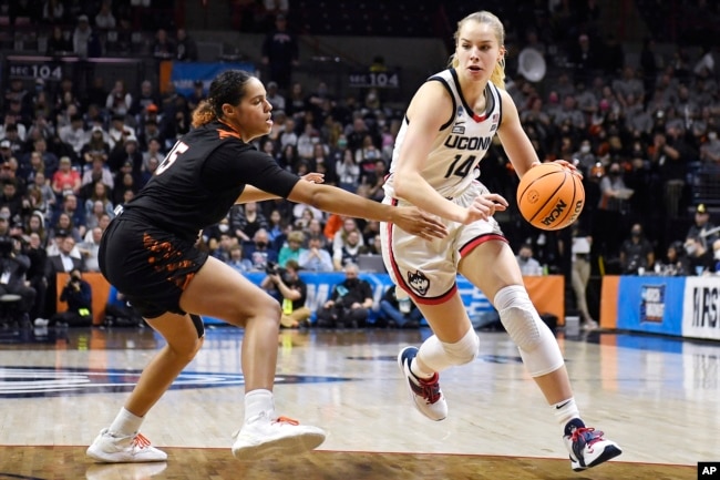 Dorka Juhasz could be making money if she still lived in Hungary. However, she is playing college basketball for the University of Connecticut. (AP Photo/Jessica Hill)