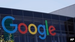 FILE - The Google logo is seen at the company's headquarters in Mountain View, California, July 19, 2016.