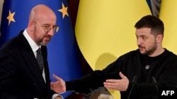 FILE - European Council President Charles Michel joins Ukrainian President Volodymyr Zelenskyy for a press conference following their talks in Kyiv on Nov. 23, 2023. The European Union will decide on Dec. 14 whether to start talks over Ukraine membership in the EU.