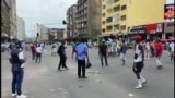 Police vehicle mowing down protesting Mozambican woman