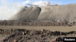 FILE - A mining machine is seen at the Bayan Obo mine containing rare earth minerals, in Inner Mongolia, China, July 16, 2011. 