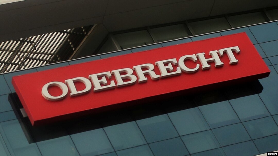 FILE - A sign of the Odebrecht Brazilian construction conglomerate is seen at their headquarters in Lima, Peru, Jan. 5, 2017. 