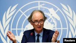 FILE - U.N. Special Envoy for Syria Geir Pedersen gestures during a news conference ahead of a meeting of the Syrian Constitutional Committee at the United Nations in Geneva, Switzerland, Aug. 21, 2020. 