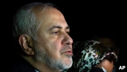 Iran's Foreign Minister Mohammad Javad Zarif speaks to the media after arriving at Viru Viru International Airport in Santa Cruz, Bolivia, early Tuesday, July 23, 2019.