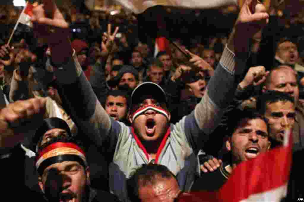 Anti-government protesters demonstrate in Tahrir Square in downtown Cairo, Egypt Thursday, Feb. 10, 2011. Thousands of state workers and impoverished Egyptians launched strikes and protests around the country on Thursday over their economic woes as anti-g