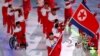 Jong Hyon Kim of North Korea carries the national flag during the opening ceremony, March 9, 2018, at the Pyeongchang 2018 Winter Paralympics in Pyeongchang, South Korea.