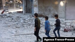 20 Ekim 2021 - İdlib'de topçu ateşine tutulan Ariha'da aralarında çocukların da olduğu en az 12 kişi yaşamını yitirdi