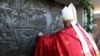 Pope Francis opens a Holy Door, one of only five that will be open during the 2025 Catholic Holy Year, at Rebibbia prison, in Rome, Dec. 26, 2024. (Photo by Vatican Media via Reuters)