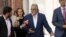 Former Indian politician and billionaire businessman Vijay Mallya, center, arrives for his extradition hearing at Westminster Magistrates Court in London, June 13, 2017. 