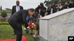 U.N. Secretary General Ban Ki-moon lays a wreath to remember his colleagues that were killed four years ago by a suicide car bombing at U.N offices in Abuja, Nigeria, Aug. 24, 2015.