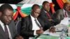 Supa Mandiwanzira (third from left) with Professor Jonathan Moyo and George Charamba.