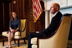 Sen. Rick Scott, R-Fla., right, meets with Judge Amy Coney Barrett, President Donald Trumps nominee for the U.S. Supreme Court, on Capitol Hill in Washington, Sept. 29, 2020.