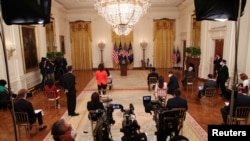 El presidente Joe Biden se dirige a los periodistas durante una rueda de prensa en la Casa Blanca, el 25 de marzo de 2021.