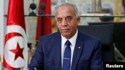 Tunisian Prime Minister-designate Habib Jemli poses for a picture during an interview with Reuters, in Tunis, Tunisia, Dec. 3, 2019. 