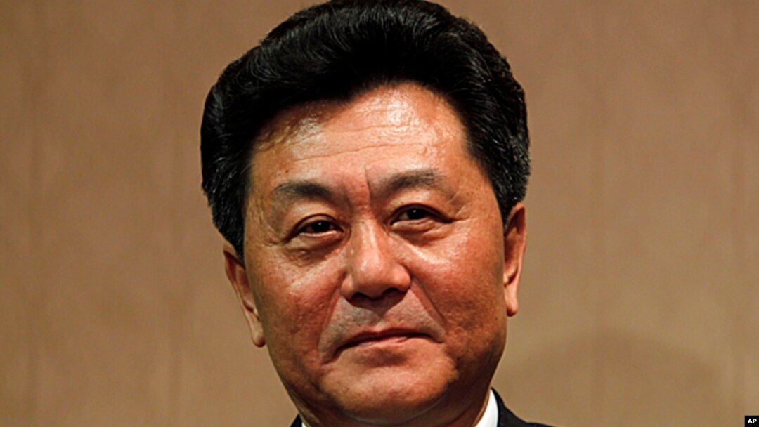 FILE - Li Gang, deputy director of the central Chinese government's liaison office in Hong Kong, May 24, 2010.