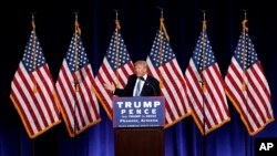 Republican presidential candidate Donald Trump speaks during a campaign rally at the Phoenix Convention Center, Aug. 31, 2016, in Phoenix, Arizona. After considering a softer position, Trump has now reverted to his original hard stance on immigration. 