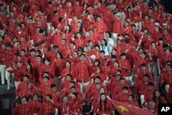 Chinese athletes parade during the Opening Ceremony for the 2024 Paralympics on Aug. 28, 2024, in Paris, France.