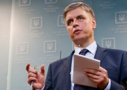 FILE - Ukrainian Minister for Foreign Affairs Vadym Prystayko gestures while speaking to the media during a news conference in Kyiv, Ukraine, Jan. 10, 2020.