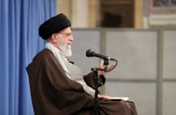 FILE - Supreme Leader Ayatollah Ali Khamenei talks to clerics in his Islamic thoughts class in Tehran, Iran, Nov. 17, 2019.