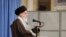 In this picture released by the official website of the office of the Iranian supreme leader, Supreme Leader Ayatollah Ali Khamenei talks to clerics in his Islamic thoughts class in Tehran, Nov. 17, 2019.