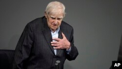 FILE - Russian author Daniil Granin speaks during a ceremony marking the Day of Remembrance for the Victims of National Socialism at the German Parliament, Bundestag, in Berlin, Germany, Jan. 27, 2014. 