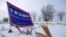 A campaign sign for Republican presidential candidate Donald Trump is seen on the side of the road in Mt. Ayr, Iowa, Jan. 22, 2016. 