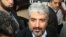 Hamas leader Khaled Meshaal arrives at the Islamist Ennahda party congress in Tunis, July, 12, 2012.