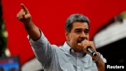 Presiden Venezuela Nicolas Maduro menyampaikan pidato dalam aacara perayaan kemenangannya dalam pemilu negara tersebut. Acara digelar di Caracas, Venezuela, pada 28 Agustus 2024. (Foto: Reuters/Fausto Torrealba)