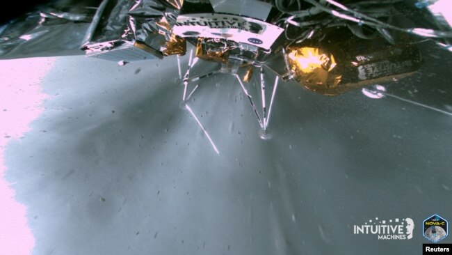 The landing strut of the Odysseus lunar lander absorbs first contact with the lunar surface during its landing on the moon, as the liquid methane and liquid oxygen engine continues to throttle, Feb. 22, 2024. (Intuitive Machines via Reuters)