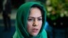 FILE - Former Afghan Parliamentarian Fawzia Koofi gestures during an interview in her office in Kabul, Afghanistan, March 3, 2014. 