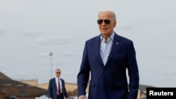 U.S. President Joe Biden walks at Joint Base Andrews before departure for a campaign event in Philadelphia, in Maryland, U.S., March 8, 2024.