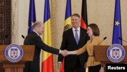 Канцлер Германии Олаф Шольц, президент Румынии Клаус Йоханнис и президент Молдовы Майя Санду. Бухарест, 3 апреля 2023 г. 