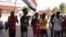 People chant slogans during a protest in Khartoum, amid ongoing demonstrations against a military takeover in Khartoum, Sudan, Nov. 4, 2021.