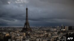 This photograph taken on Feb. 23, 2024, shows the Eiffel Tower on a cloudy day in Paris. The monument will reopen to tourists on Feb. 25 after staff ended their strike.