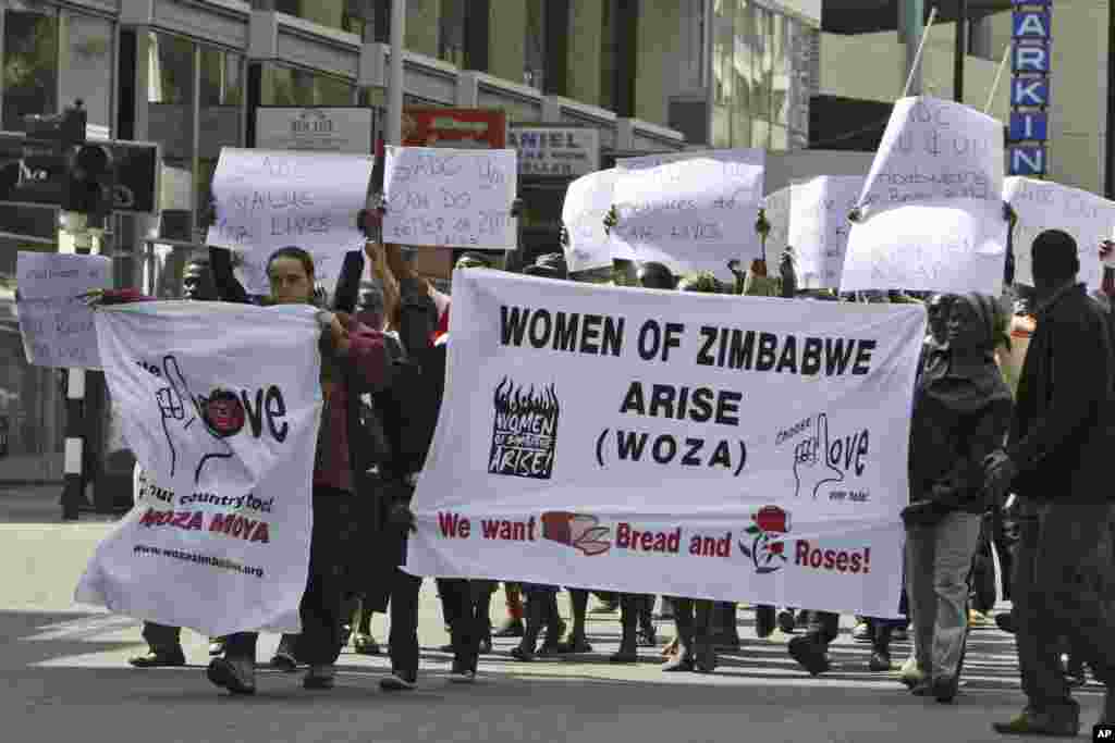 Women of Zimbabwe take to the streets of Harare, Zimbabwe Wednesday May, 28, 2008. The women were demonstrating against human rights abuses and called upon the Zimbabwean government to comply with the South African Development Community, SADC, principles governing elections which are set for June 27, 2008.