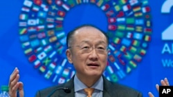 Global Finance: World Bank President Jim Yong Kim gesture while speaking at a news conference during the World Bank/IMF Annual Meetings at IMF headquarters in Washington, Thursday, Oct. 6, 2016.