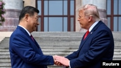 U.S. President Donald Trump participates in events at the Great Hall of the People and greets President of the People’s Republic of China Xi Jinping May 14, 2026, in Beijing China.