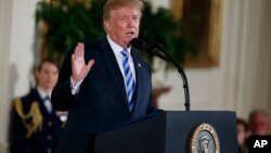 President Donald Trump speaks during the Public Safety Medal of Valor awards ceremony in the East Room of the White House, Feb. 20, 2018, in Washington.