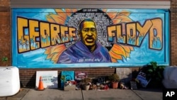 George Floyd Square is shown on Feb. 8, 2021, in Minneapolis. Ten months after police officers brushed off George Floyd's moans for help on the street outside a south Minneapolis grocery, the square remains a makeshift memorial for Floyd who died at…
