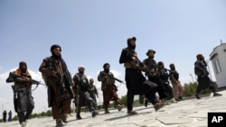 Taliban fighters patrol in Kabul, Afghanistan, Aug. 19, 2021. 