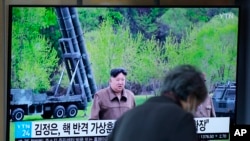 A TV screen shows an image of North Korean leader Kim Jong Un during a news program at the Seoul Railway Station in Seoul, South Korea, April 23, 2024. Kim Jong Un supervised salvo launches that simulated a nuclear counterattack against enemy targets, state media said Tuesday.