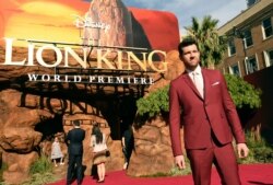 Billy Eichner, a cast member in "The Lion King," poses at the premiere of the film, July 9, 2019, in Los Angeles.