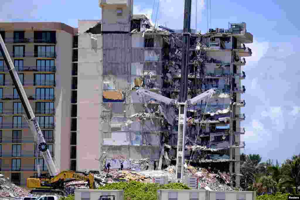 El personal de b&#250;squeda y rescate contin&#250;a buscando v&#237;ctimas d&#237;as despu&#233;s de que un edificio residencial colapsara parcialmente.