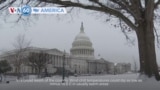 VOA60 America - Bitter cold and snow hit the southern US