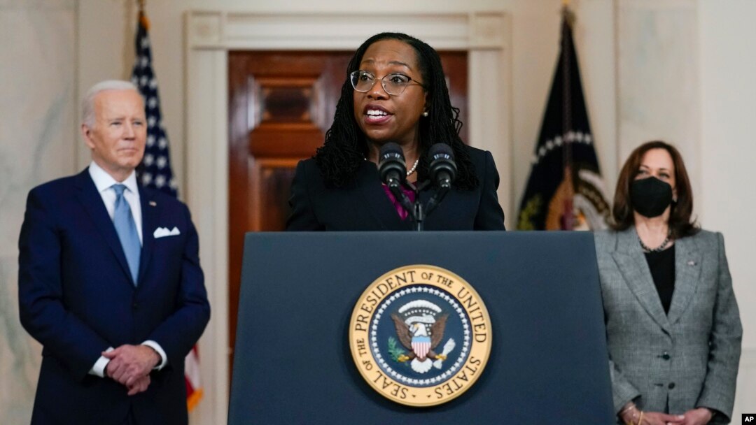 Judge Ketanji Brown Jackson speaks after President Joe Biden announced Jackson as his nominee to the Supreme Court in the Cross Hall of the White House, Friday, Feb. 25, 2022, in Washington. Vice President Kamala Harris listens as right. 