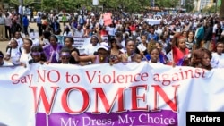 Women take part in a protest, demanding justice for a woman who was attacked and stripped recently in Nairobi by men who claimed that she was dressed indecently, in Nairobi, Kenya, Nov. 17, 2014. 