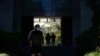 FILE - Students make their way through the University of Chicago campus, in Chicago, Illinois, May 6, 2021, as many U.S. institutions of higher learning are making plans to bring back foreign students for the fall semester.