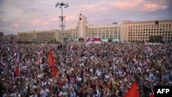 Opposition supporters protest against disputed presidential elections results at Independence Square in Minsk, Belarus, Aug. 18, 2020.