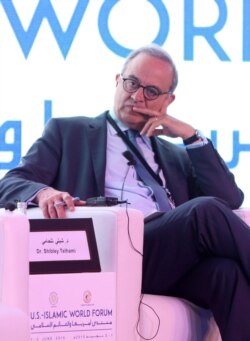 FILE - Marwan Muasher attends a panel discussion as part of the US-Islamic World Forum on June 1, 2015, in the Qatari capital Doha.